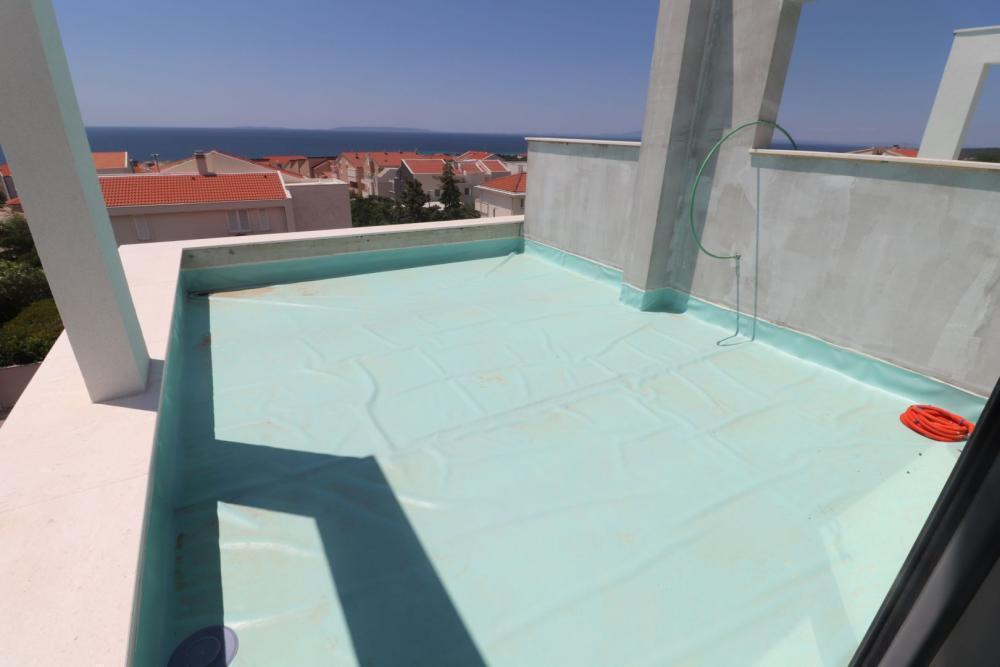 Dwupoziomowy penthouse z tarasem na dachu w Pag w Novalji Dwupoziomowy penthouse z tarasem na dachu w Pag w Novalji