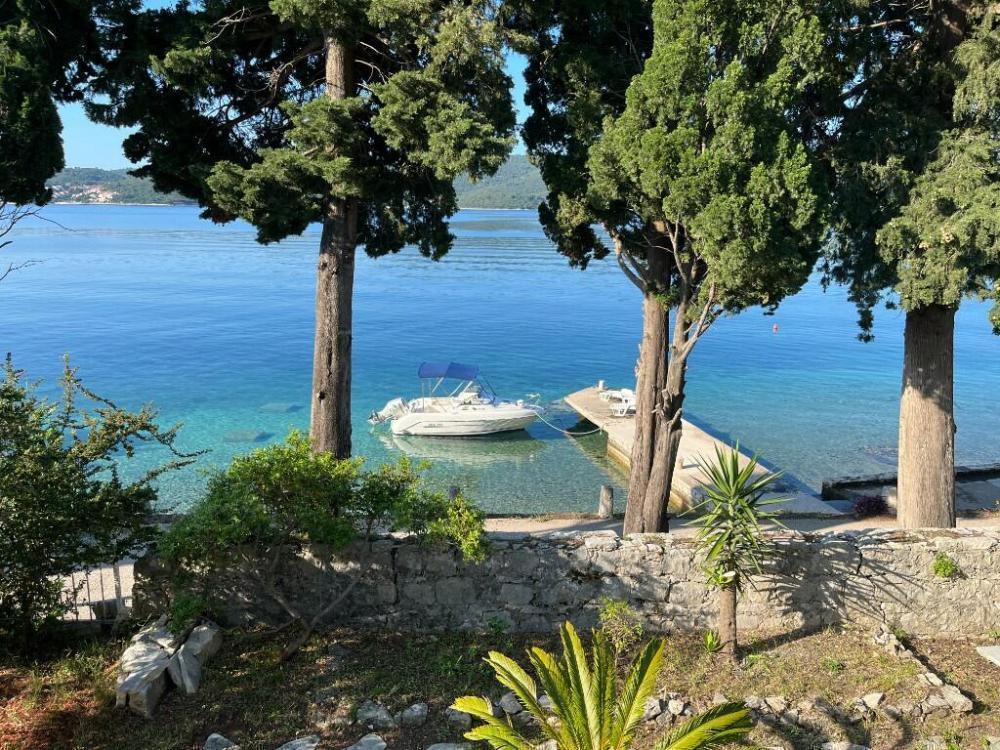 First line stone property on Peljesac peninsula, with the pier in front of the house 