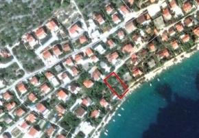 Seafront land plot on Ciovo for construction purposes, Trogir area 