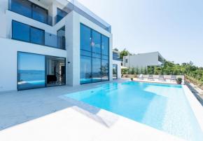 Fantastic ultramodern villa in Veprinac over Opatija, with breathtaking sea views 