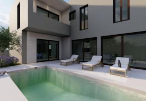 Modern semi-detached villa with swimming pool just 200 meters from the sea, final stage of construction 