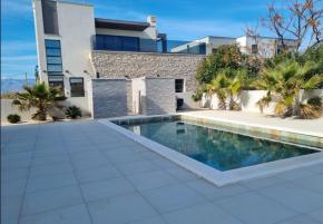 Modern villa with a swimming pool near Zadar just 120 meters from the sea 