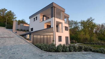 New modern building in Omisalj with two apartments second row to the sea 