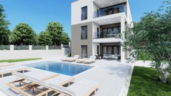 Новый апарт-комплекс с бассейном современной архитектуры в районе Пореча, в 8 км от моря 