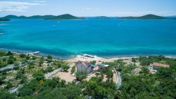 Beautiful isolated villa with private pier and beach 