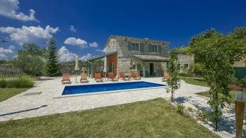 Stylish stone villa with swimming pool and additional building 