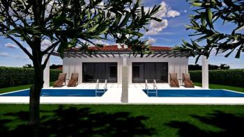 New structure in Buje with two apartments and two swimming pools 