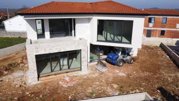 Modern villa under construction in Porec area, traditional design 