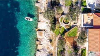 A seafront house in a fantastic bay on Korcula island, with boat mooring in front 