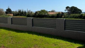 Apartment in a new building with a garden, 450m from the sea in Liznjan, for sale 