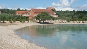 Exceptional waterfront building on Peljesac next to a wonderful beach, on 12 500 sq.m. of land (1,2 ha) 