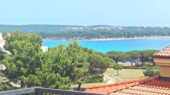 Duplex apartment of 93 sq.m. just 200 m from the beach, with sea views in Medulin! 