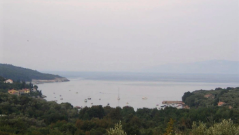 Mix of urbanized and non-urbanized land in Rabac, Labin, with sea views 