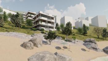 Great seafront land plot on Omis riviera by the beach 