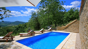 Two stone houses with swimming pool in Oprtalj with magic views over Motovun 