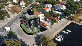 Appartement de luxe dans une villa urbaine en 1ère ligne de mer à Sukosan 