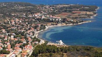 Land plot in Bašanija, Umag, first line to the sea, T3 zoning for camping 