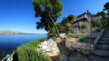 Seafront house with 3 apartments, terraces and private beach on Ciovo, Trogir 