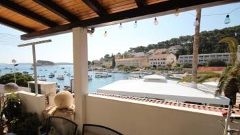 First line apartment in Hvar with direct sea view 