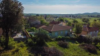 Urban land plot with distant sea views in Flengi near Vrsar 