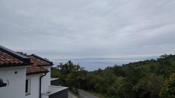 Пять рядных домов площадью 590 м2 с видом на море и 2 бассейнами в Ичичи 