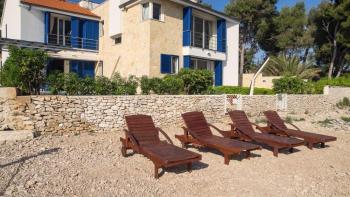 Unique property with two swimming pools first line to the sea in Supetar, island of Brac 