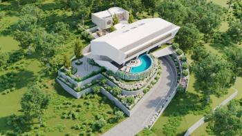 Ideales Grundstück für ein Familienhaus nahe dem Strand von Kostrena, ruhig, mit Aussicht, nahe der Stadt Rijeka, zu verkaufen 