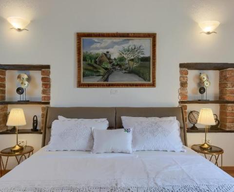 A beautiful stone villa for sale with a swimming pool in Tinjan - pic 27