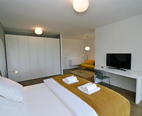 Exklusive Wohnung 50 m vom Meer entfernt in einer Residenz mit Innenpool in Lovran, zu verkaufen - foto 17