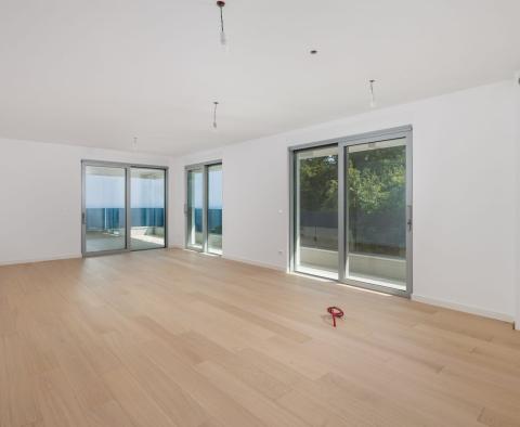 Exclusive apartment in a new building in Opatija with sea view, shared pool, garage, for sale - pic 3