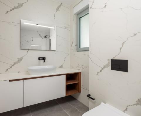 Exclusive apartment in a new building in Opatija with sea view, shared pool, garage, for sale - pic 16