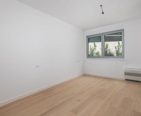 Exclusive apartment in a new building in Opatija with sea view, shared pool, garage, for sale - pic 24
