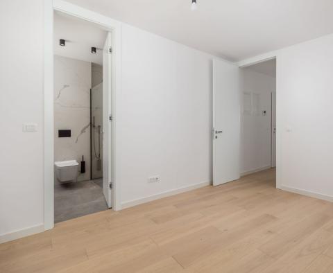 Exclusive apartment in a new building in Opatija with sea view, shared pool, garage, for sale - pic 26
