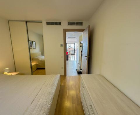 Bel appartement avec terrasse et place de garage offrant une vue fantastique sur la mer, piscine, à Opatija, à vendre - pic 18
