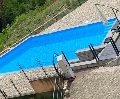 Bel appartement avec terrasse et place de garage offrant une vue fantastique sur la mer, piscine, à Opatija, à vendre - pic 3