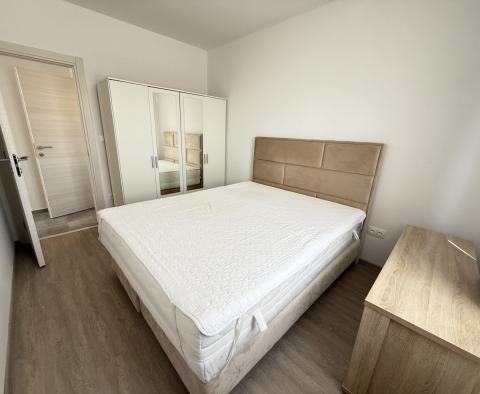Moderne Wohnung in einem Komplex mit Gemeinschaftspool 60m vom Meer in Smokvica, zu verkaufen - foto 12