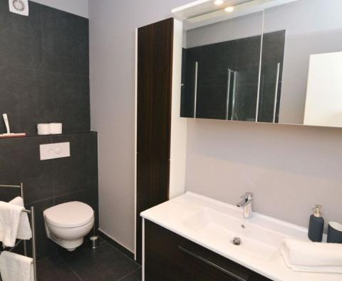 Exklusive Wohnung mit 3 Schlafzimmern, nur 50 m vom Meer in Lovran entfernt, in einer Boutique-Residenz mit Innenpool, zu verkaufen - foto 13