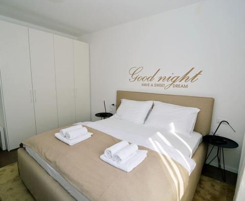 Exklusive Wohnung mit 3 Schlafzimmern, nur 50 m vom Meer in Lovran entfernt, in einer Boutique-Residenz mit Innenpool, zu verkaufen - foto 27
