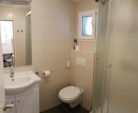 Maison d'appartements à 500 m de la mer à Supetar, à vendre - pic 32