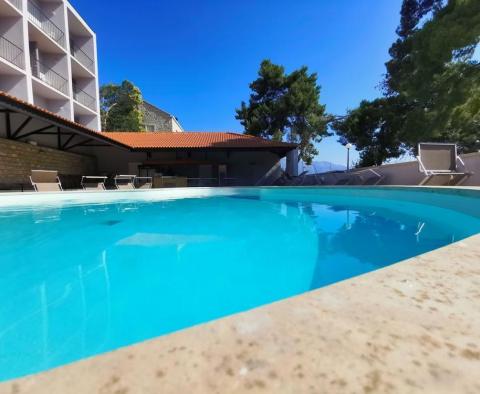 Lovely first line hotel of 45 rooms (121 beds) on Korcula for sale first line to the sea, rent also possible 
