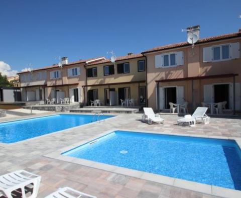 Furnished attached villas for sale in Vabriga in a gated community with swimming pool 