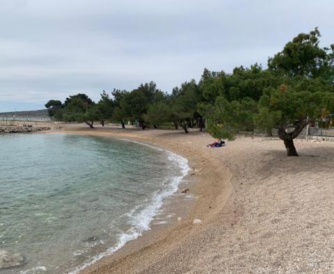 Land plots in Punat on Krk on the first construction line to the sea and up 