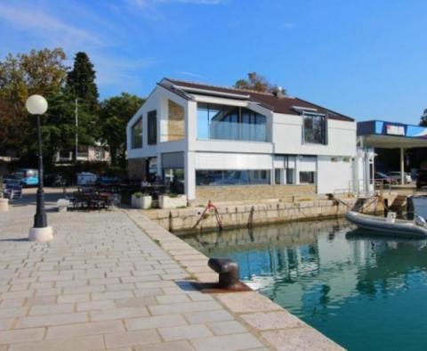 Seafront building with restaurant on Crikvenica riviera next to luxury marina 