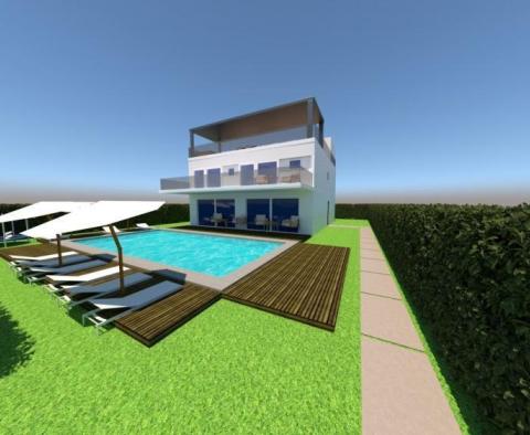 Urban land with a project for lux villa, with sea view, Porec area, just 900 meters from the sea 