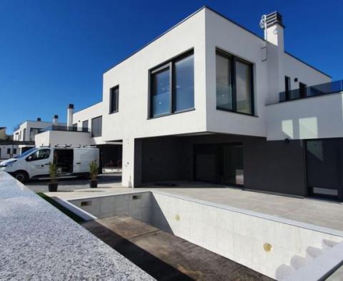 One of the best investments in Istria now - modern new villa with sea views just 50 meters from the sea 