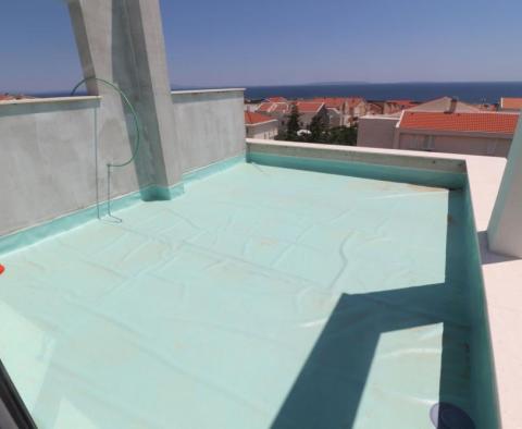 Двухуровневый пентхаус с террасой на крыше в Паге, Новалья - фото 23