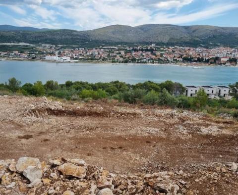 Land plot on Ciovo with building permit for new modern villa, just 170 meters from wateredge 