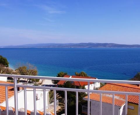 Self-standing apart-house of 4 apartments in Baska Voda just a few meters from the beach 