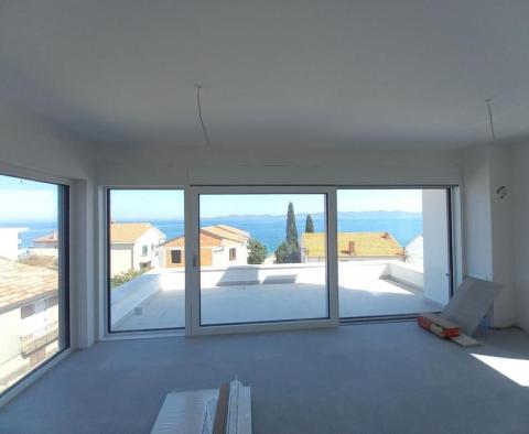 Новая двухуровневая квартира с террасой на крыше всего в 40 метрах от пляжа - фото 6
