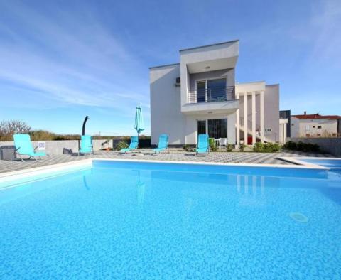 Elegant modern villa with 4 apartments for sale in Zaton - pic 11
